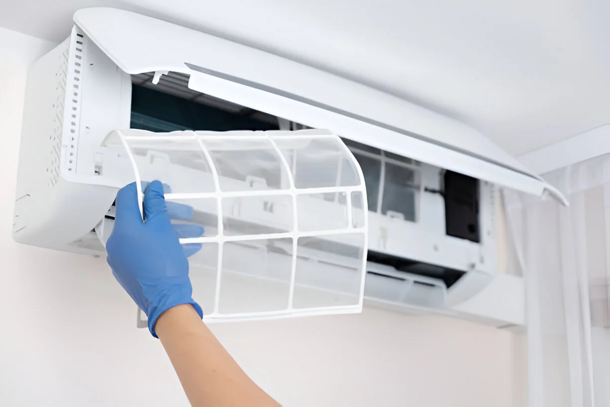 Home 10 Certified technician performing residential air conditioning services